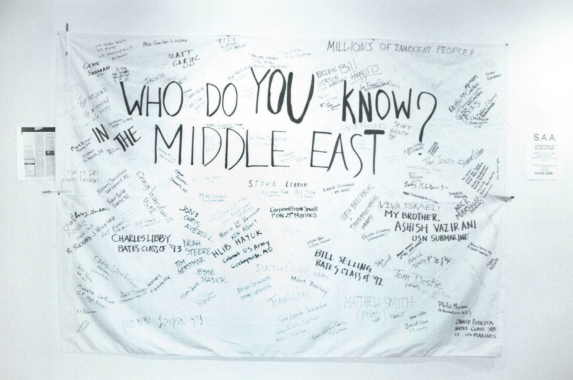 Following the start of the Persian Gulf War in January 1991, a sheet hangs, likely in Chase Hall, offering community members the chance to write the names of people they know in the Middle East. (Bates Communications)