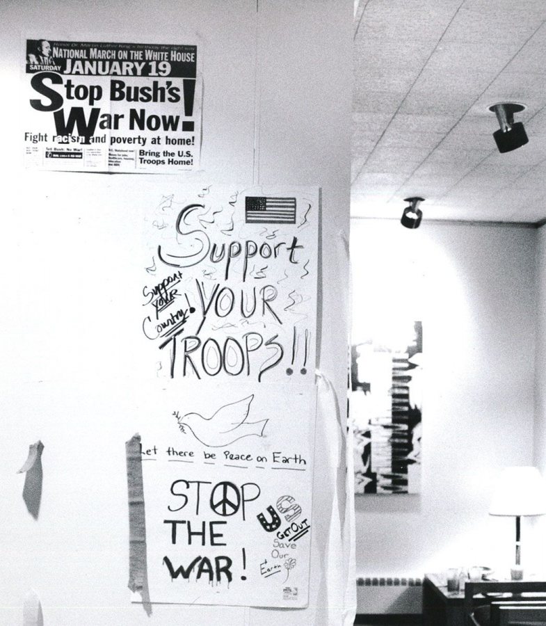 During the Persian Gulf War, the slogan "support the troops" emerged alongside anti-war messages, like these, likely in Chase Hall Gallery. (Bates Communications) 