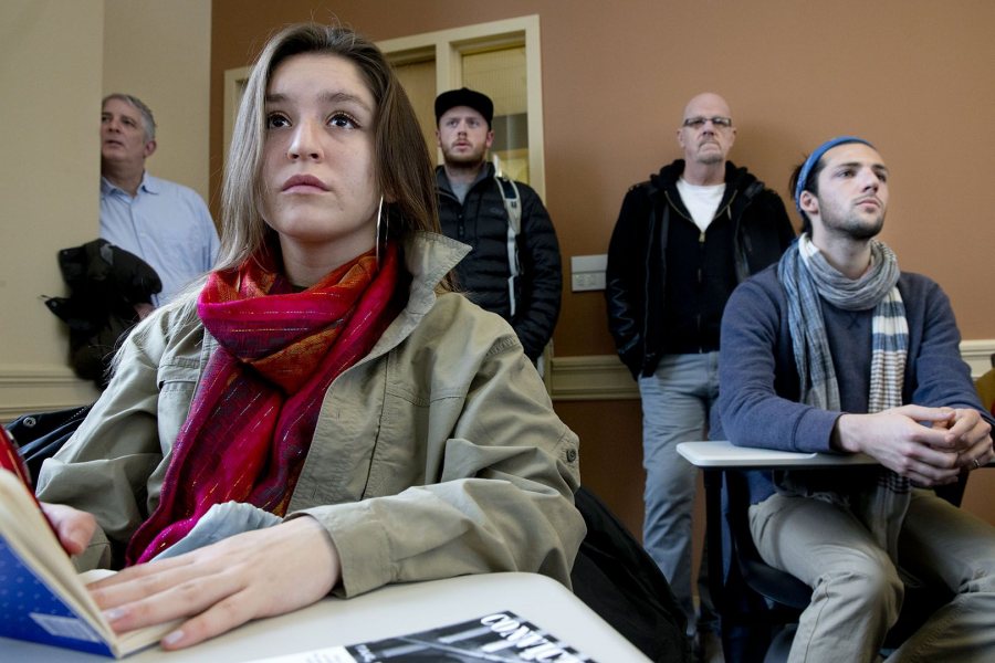 A student listens to the panel discussion on "Global Accounts of State Violence and Identity." (Phyllis Graber Jensen)