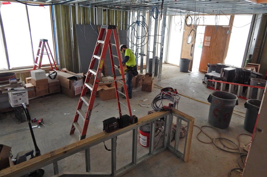 At work in the lobby of 55 Campus Ave. on Feb. 16, 2016. (Doug Hubley/Bates College) 