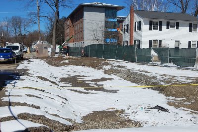 A swale idea: This pit will be used to filter storm runoff and discharge it, clean, into the city storm drains. (Doug Hubley/Bates College)