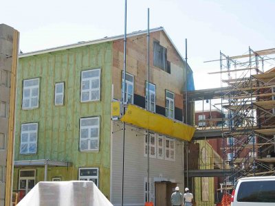 Cementitious siding on the center section of 280 College St. (Doug Hubley/Bates College)