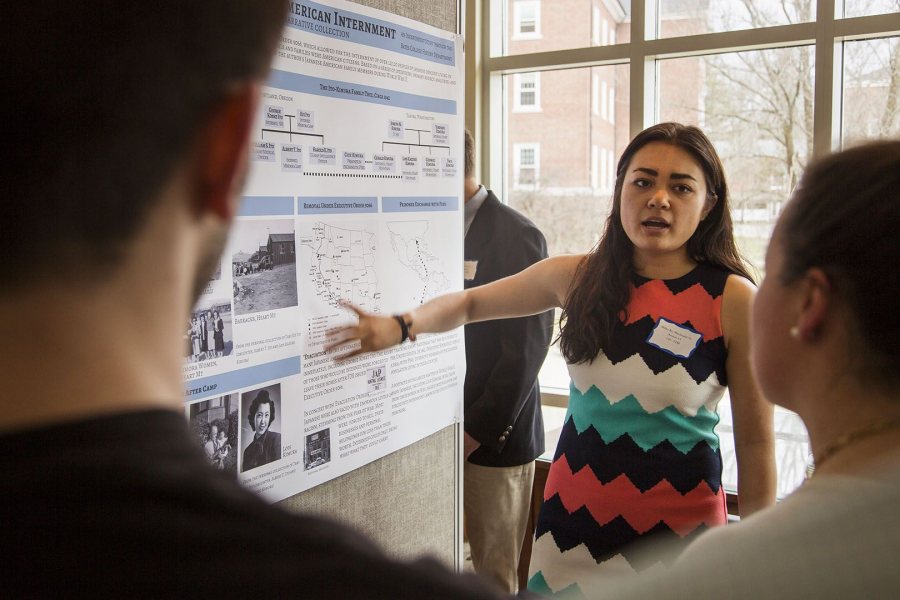 Politics major Mikka Kei Macdonald ’16 of Catonsville, Md., presents her poster. (Josh Kuckens/Bates College)