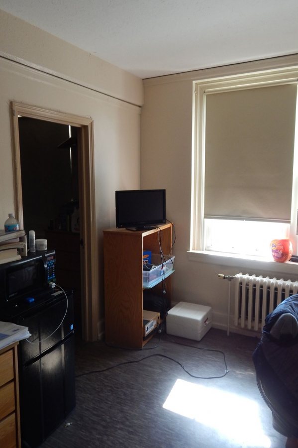 The doorway at left leads to the four-bunk bedroom in a typical Smith Hall suite. A renovation project in summer 2016 will convert Smith from quads to doubles. (Doug Hubley/Bates College)