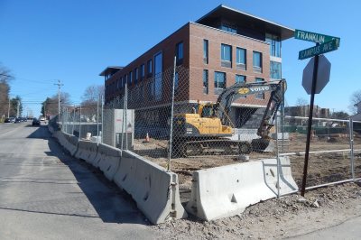 The construction fence was on its way out and Gendron & Gendron was doing site work at 65 Campus on April 15, 2016. (Doug Hubley/Bates College) 