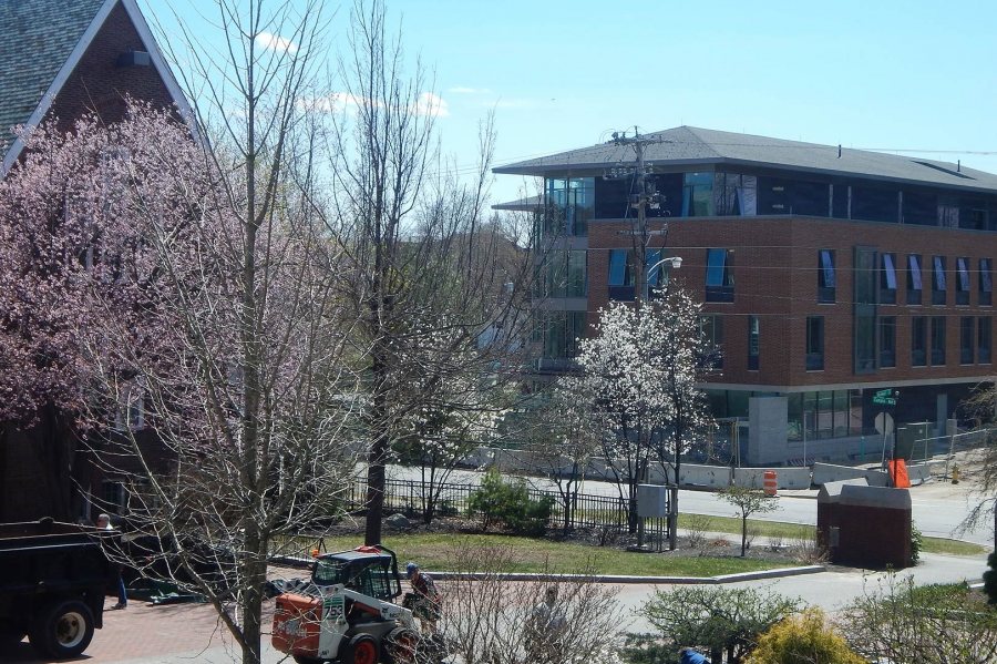 55 Campus Ave. seen through April blossoms from a second-floor window at Carnegie Science. (Doug Hubley/Bates College) 