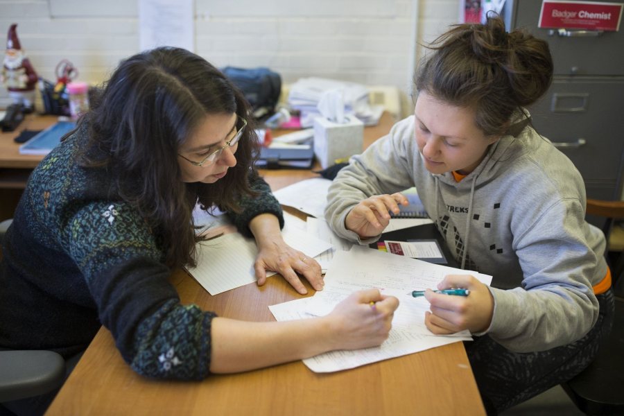 In her second floor Dana Chemistry office, biochemistry professor Paula Schlax helps AsiaLuna Patois '19 of Baltimore, Md. prepare for a chemistry exam.