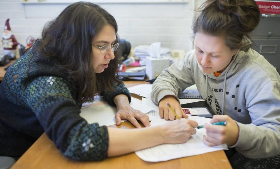 In mid-April, Professor of Chemistry Paula Schlax works with AsiaLuna Patlis ’19 of Baltimore during finals week. Schlax is the 2016 recipient of the Kroepsch Award for Excellence in Teaching. (Phyllis Graber Jensen/Bates College)