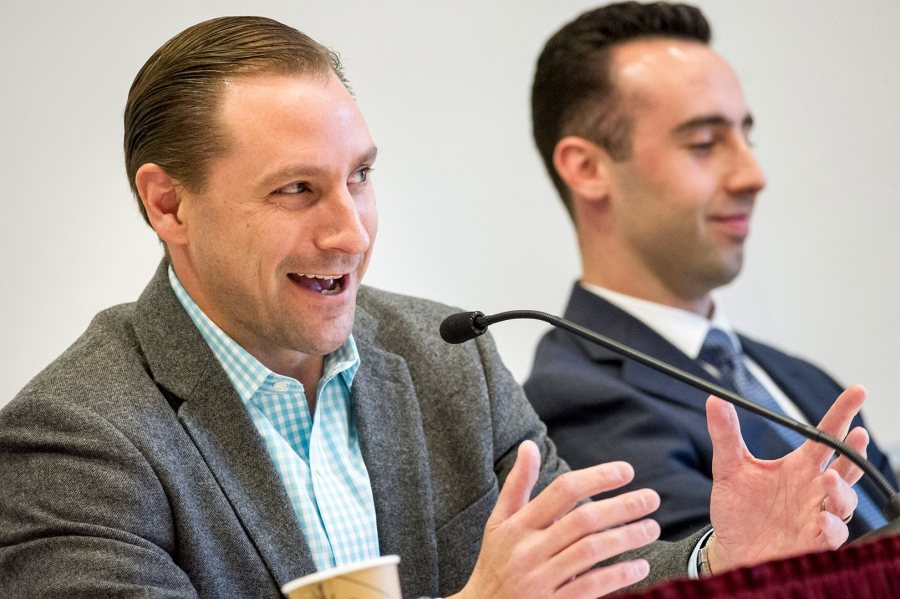 Real estate attorney Hawley Strait '00, at left, shares an insight into the post-college housing hunt as fellow "How to Apartment" panelist Vince Ciampi of CBRE | The Boulos Company reacts. (Josh Kuckens/Bates College) 