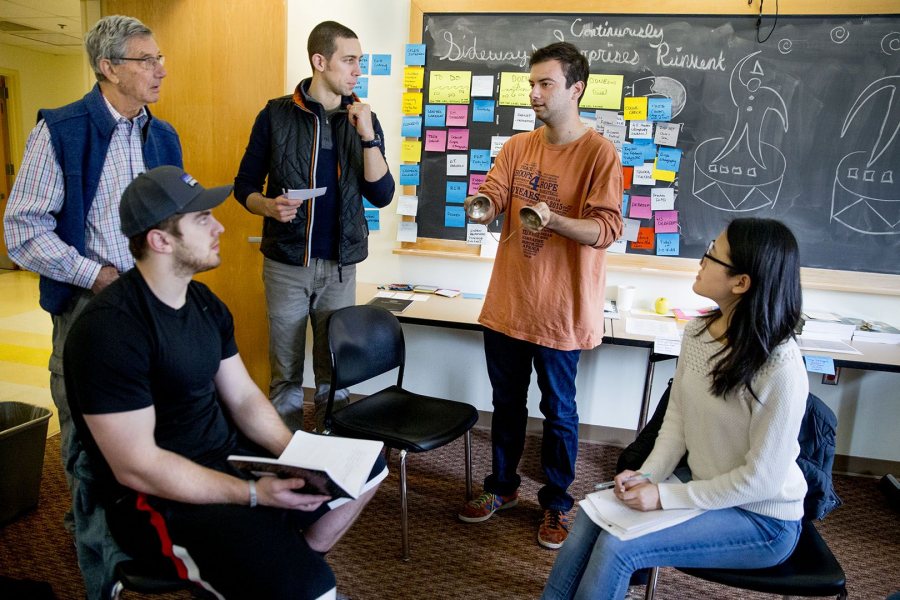 Yutong Li ’18 (right) of Shanghai, China, listens as Fisher Qua leads a discussion during the Short Term practicum "Consulting for Strategy Development (Phyllis Graber Jensen/Bates College)