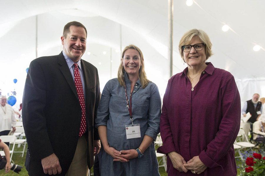 Jill Kopicki Blankenhorn '03, recipient of the David G. Russell Alumni-in-Admission Award at Reunion on June 11, poses with President of the Alumni Association Michael Lieber '92 and President of Bates College Clayton Spencer. (Josh Kuckens/Bates College)