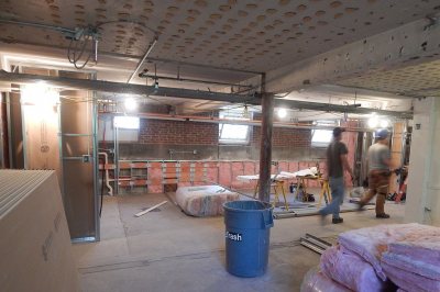 At rear in this photo taken July 5, 2016, a kitchen and banquette will be installed in this recreation area in the basement of Smith Hall. (Doug Hubley/Bates College)