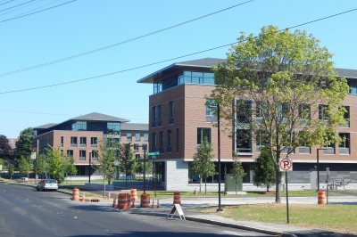 The green A-frame barriers around 65 and 55 Campus Ave. are just a memory. Now if we could only lose the orange barrels. (Doug Hubley/Bates College)