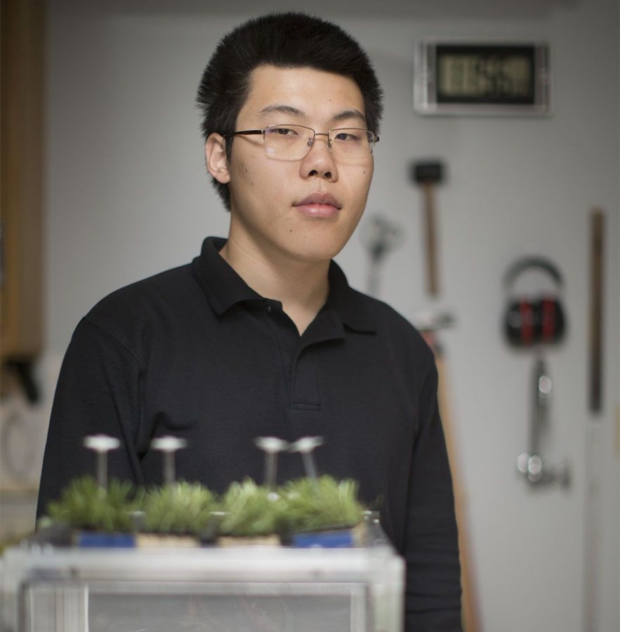 Xioameng Wang '19 poses in the lab of Assistant Professor of Biology Carla Essenberg. (Phyllis Graber Jensen/Bates College)