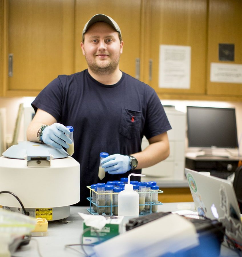 Will Hilton '17 in the lab of Professor of Environmental Studies Holly Ewing. (Phyllis Graber Jensen/Bates College)