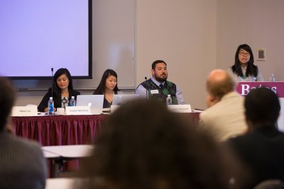 At the lectern, Aileen Liu of the University of California, Berkeley, gives a presentation on storytelling in Shakespeare's "Cymbeline." The listeners include fellow presenters (from left) Kirsten Mendoza, Vanderbilt University; Jennifer Park, University of North Carolina at Chapel Hill; and Jose Villagrana, also of UC at Berkeley. (Phyllis Graber Jensen/Bates College) 