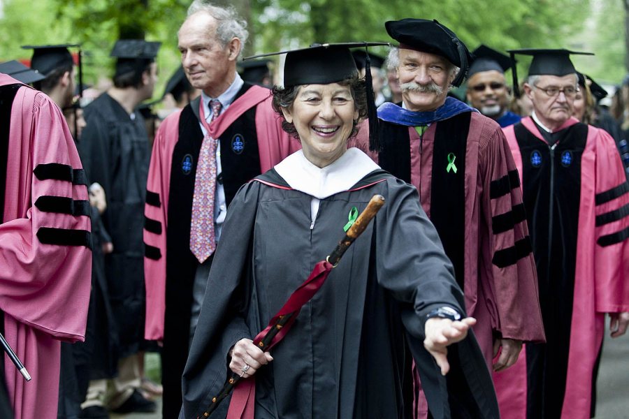 A faculty marshal from 2002 to 2014, Marcy Plavin relished the honor, from organizing her colleagues before the event to leading the faculty procession and helping with the presentation of diplomas, all with grace and energy. (Phyllis Graber Jensen/Bates College)