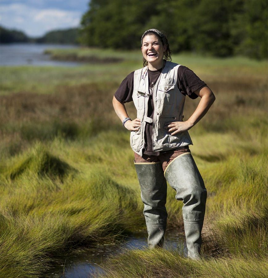 Cailene Gunn '16 of Granby, CT poses for a portrait at Long Marsh in Harpswell, ME. Gunn has been conducting field research under the supervision of Geology professor Beverly Johnson to measure methane gas and salinity levels following reclamation efforts.