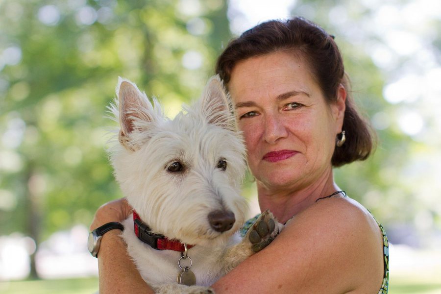 Laura Faure, director of the Bates Dance Festival, poses with Finn on the Bates campus in July 2012. (Phyllis Graber Jensen/Bates College)