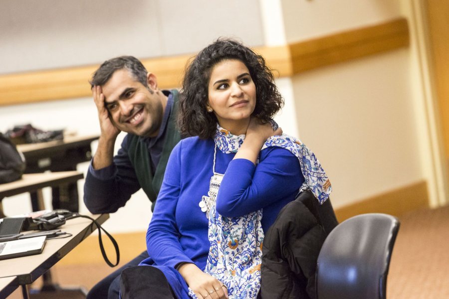 Saudi artists Ahmed Mater and Arwa Al Neami speak to Dana Professor of Anthropology Loring Danforth's class on myth, folklore, and popular culture during their visit to Bates for the opening of Phantom Punch at the Museum of Art. (Josh Kuckens/Bates College)