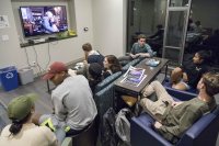 Students in a Chu Hall lounge gather to watch a movie. (Josh Kuckens/Bates College)