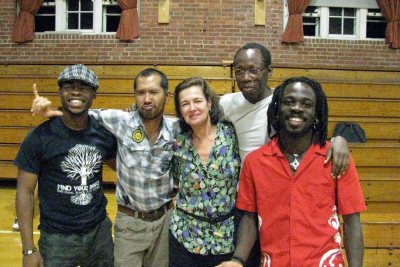 Laura Faure, center, is shown with members of the dance festival's International Artists Program in 2009 in Bates' Alumni Gym: from left, Nigerian artist Qudus Onikeku, Jose Jay B. Cruz of the Philippines, Faure, Opiyo Okach of Kenya and France, and Ivory Coast artist Michel Kouakou. (Bates Dance Festival)