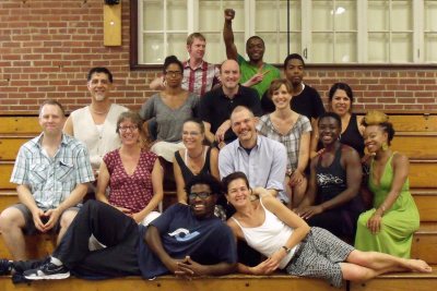 Laura Faure, front row at right, poses in Alumni Gym in July 2011 with members of the Bates Dance Festival's Young Dancers Workshop faculty. (Bates Dance Festival)