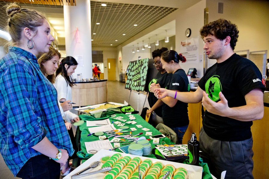 Blake Reilly talks with students during a special Green Dot dinner held during program's launch in fall 2015. 