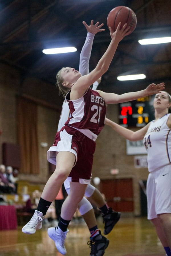 Women's basketball opens the new year for the Bobcats. Shown in a February 2016 game against Williams is co-captain Bernadette Connors '17. (Phyllis Graber Jensen/Bates College)