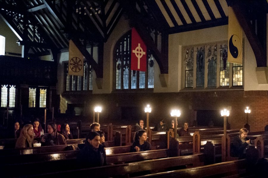 Students gather by candlelight in the Gomes Chapel on Nov. 30 2016 for Pause.