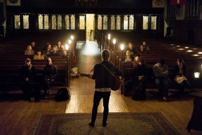 Jackson Whitehouse '17 of Cleveland plays the guitar during the Nov. 30 {Pause}, sponsored by the Multifaith Chaplaincy. (Josh Kuckens/Bates College) 