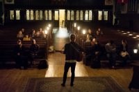 Jackson Whitehouse '17 of Cleveland, Ohio, plays the guitar during Pause on Nov. 30.