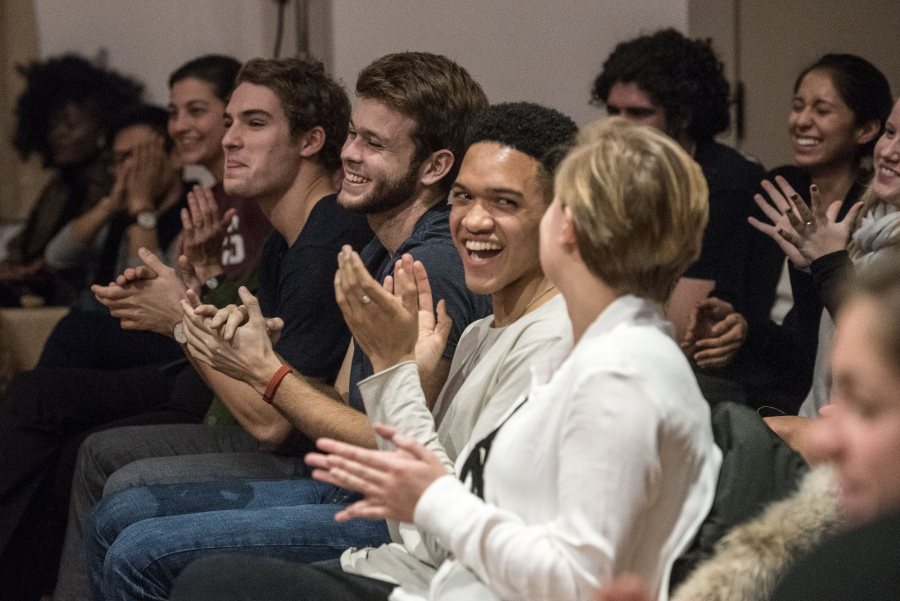 Calvin Reedy ‘17 of Wilton, Conn., enjoys a moment with fellow storyteller during the Dec. 5 session of The Dinner Table, a prompt-based dinner program that helps students talk constructively across differences, spark friendships and alliances, and build conversation skills — all imperative to success in the world beyond Bates. (Andree Kehn for Bates College)