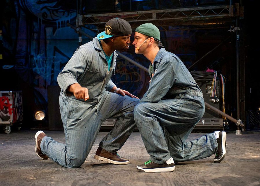 In Chicago Shakespeare Theater’s production of Othello: The Remix, Postell Pringle '98 (left, as Othello) and GQ (Iago) face off as Iago’s plot unfolds. (Photograph by Michael Brosilow)
