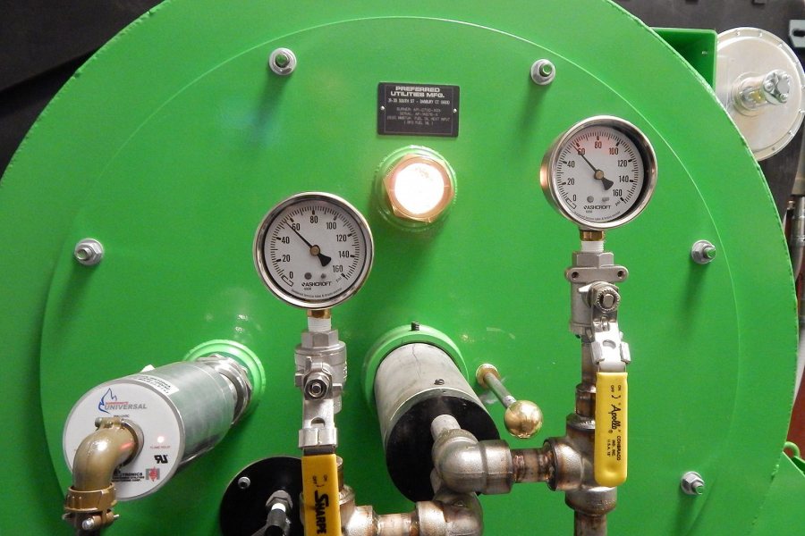 The new RFO burner on the central steam plant's boiler No. 1. Note the viewing port between the gauges. (Doug Hubley/Bates College) 