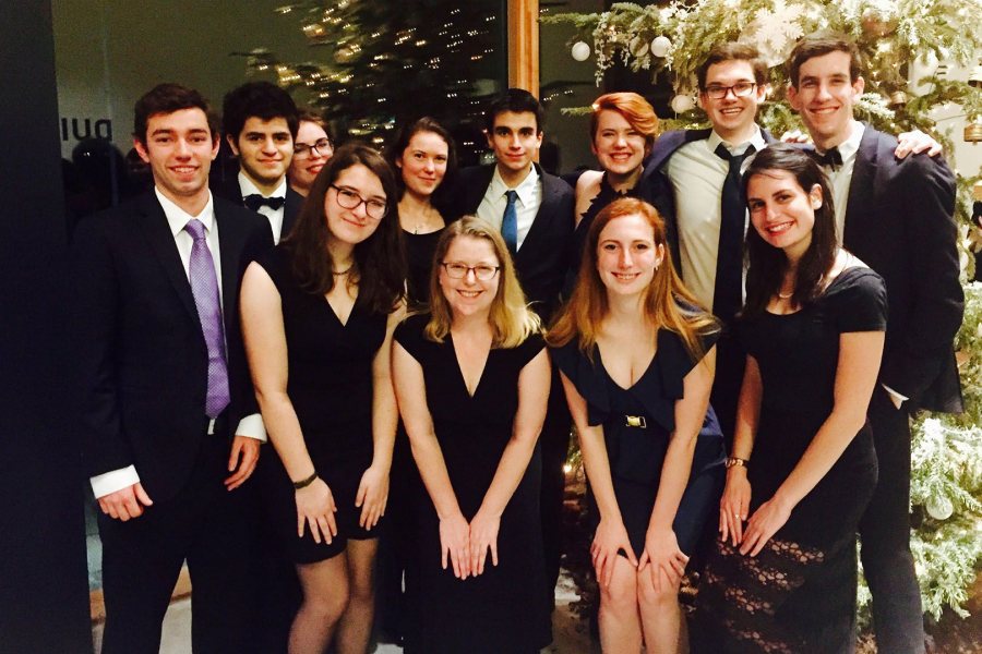 The Bates contingent poses for a photo during WUDC 2017, including Taylor Blackburn '15 (back row, third from right) whose team advanced to the octofinal round in 2015. (Tess Holtzman '18)