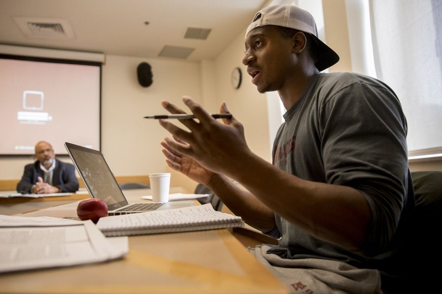 Ben Coulibay '17, a philosophy major from Philadelphia, joins the discussion on Dec. 8 during the Benjamin Mays course taught by Marcus Bruce '77, the Benjamin E. Mays Distinguished Professor of Religious Studies. (Phyllis Graber Jensen/Bates College)