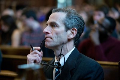 Vice President for Academic Affairs and Dean of the Faculty Matt Auer listens to the keynote address during the 2016 Martin Luther King Jr. Day observance at Bates. (Phyllis Graber Jensen/Bates College)