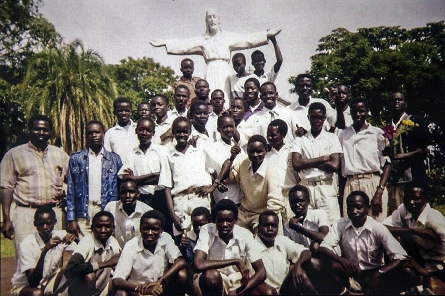 Patrick Otim, 14, third row, third from left, posing with his classmates at the Sacred Heart Seminary in Gulu, Uganda. 