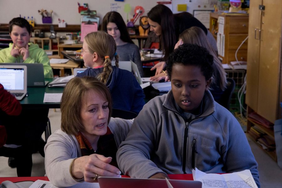 With the students' essays due the following day, Weber and Erbafina (upper right) are ready to help. (Phyllis Graber Jensen/Bates College) 