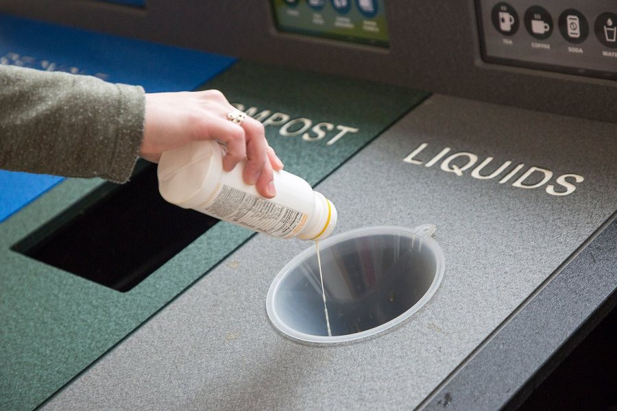 The new waste stations' liquid-collection system makes life nicer for custodians and helps keep stray liquids from spoiling recyclables. (Josh Kuckens/Bates College)