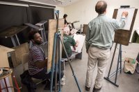 Deshun Peoples '17 (left) of Chicago is among the artists who joined the figure drawing session on March 8. (Josh Kuckens/Bates College)