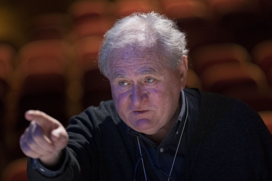 Martin Andrucki provides post-dress rehearsal comments from his director's notes at the foot of the Schaeffer Theatre stage. (Phyllis Graber Jensen/Bates College)