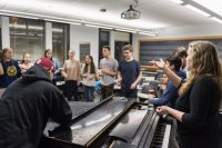 Maddie McLean '17 of Hood River, Ore., conducts the group. 