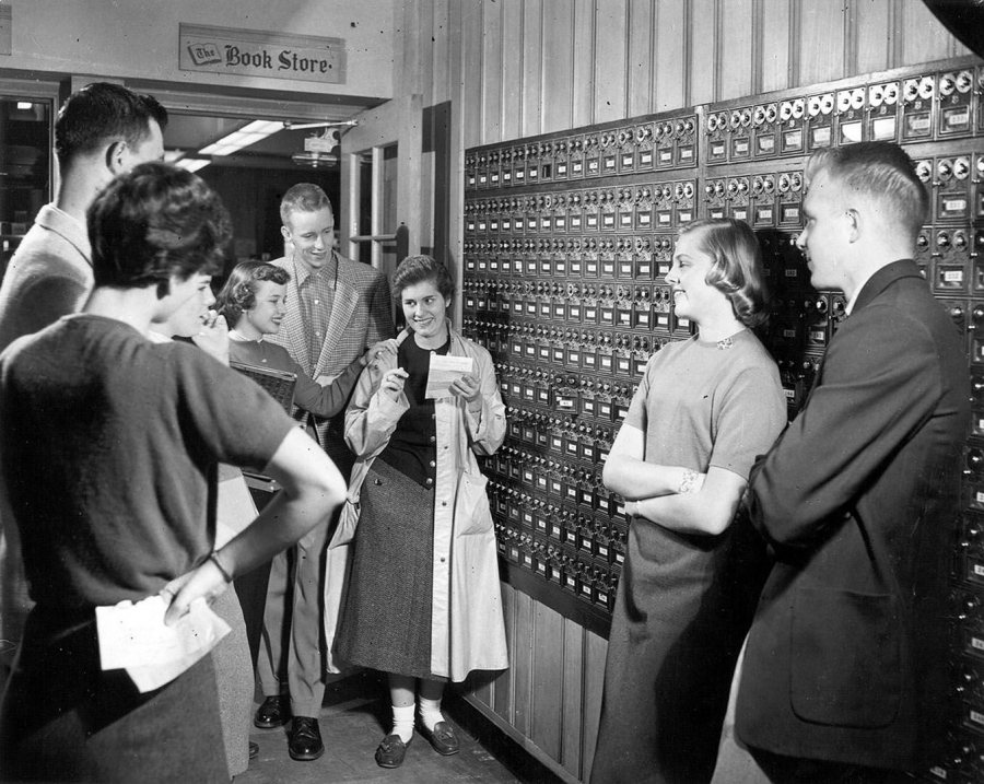 Students get their mail in Chase Hall this 1950s photograph. Then and now, "the warmth of [Bates] has endured since Dad was here," says Mike Bonney. (Muskie Archives and Special Collections Library)