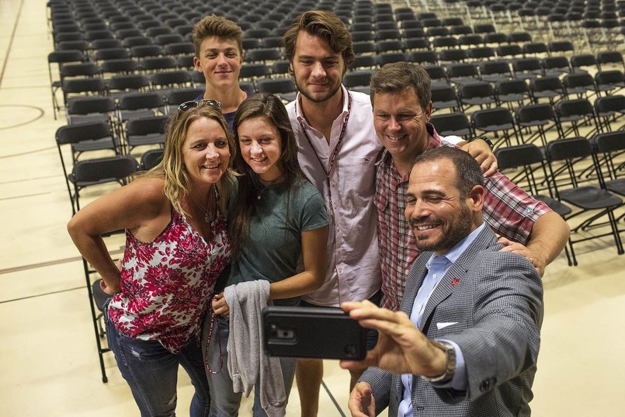 Director of Athletics Jason Fein snaps a selfie with the Cote family after his Opening Day welcoming remarks to student athletes and their families at the Clifton Daggett Gray Athletic Building on Aug. 28. Jackson Cote '21 (center) of Wilton, Conn., is an aspiring rower. (Theophil Syslo/Bates College)