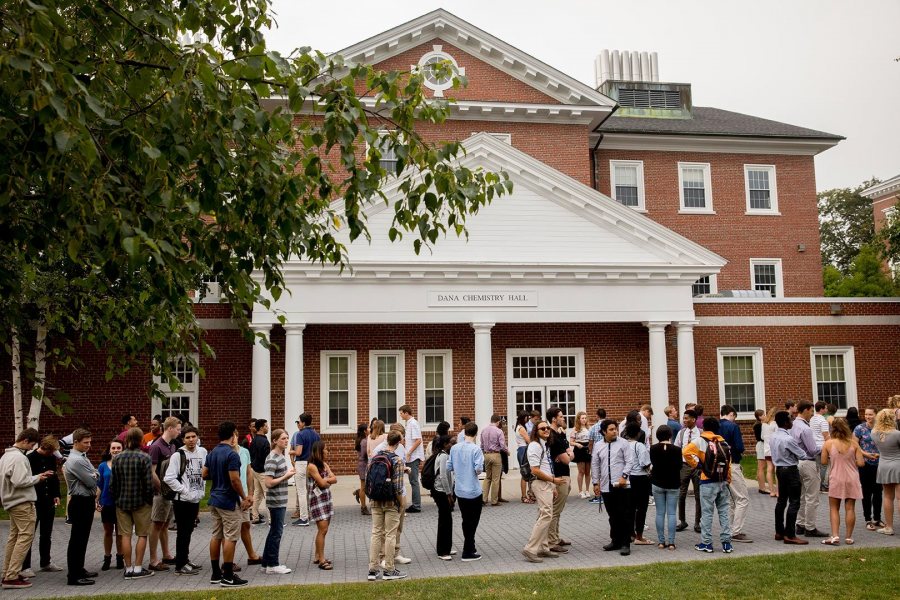 Shown on Alumni Walk on Sept. 5, Convocation Day, members of the Class of 2021 prepare to march in their first academic procession at Bates. (Phyllis Graber Jensen/Bates College)