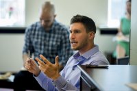 Christopher Petrella '06 makes a point during a meeting of the college's  Justice and Equity Reading Group on Sept. 13, 2017. Petrella, faculty lecturer and associate director of programs for the Office of Equity and Diversity, is the group organizer. (Phyllis Graber Jensen/Bates College)