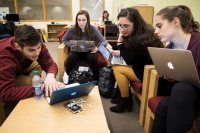 Conor Regan '20, Jacqueline Buonfiglio '19,  Claire Sickinger '19, and Sara Buscher '19 study together in the Academic Resource Commons. (Theophil Syslo/Bates College)