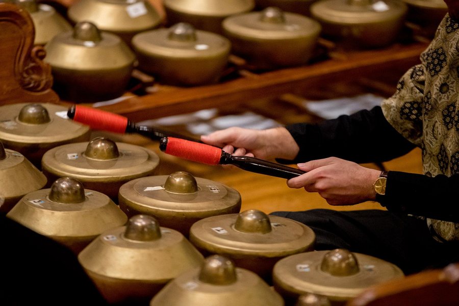 Playing the "bonang." (Phyllis Graber Jensen/Bates College)